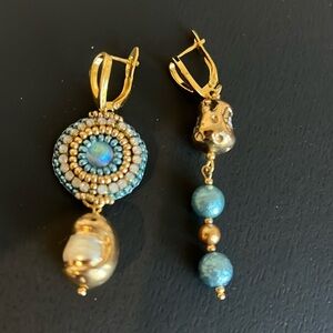 earrings made of blue beads